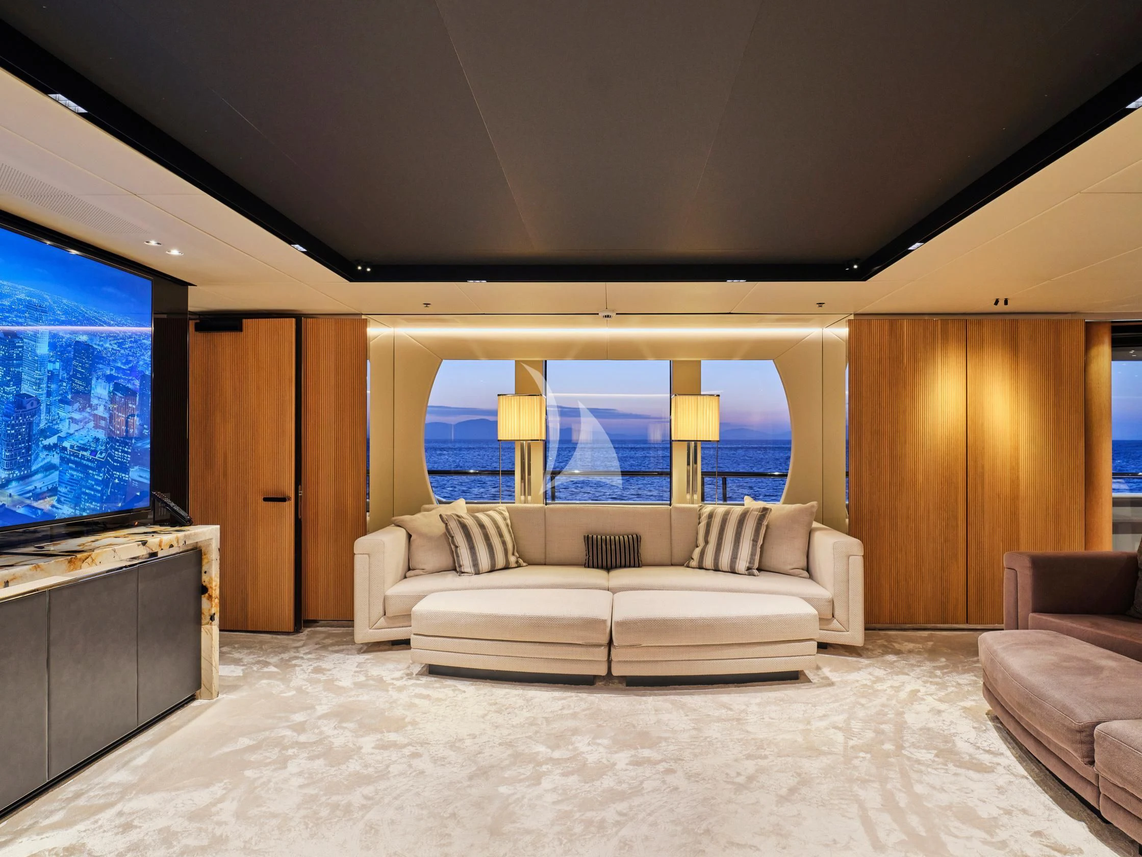 a living room with a large window aboard SEAHORSE Yacht for Sale