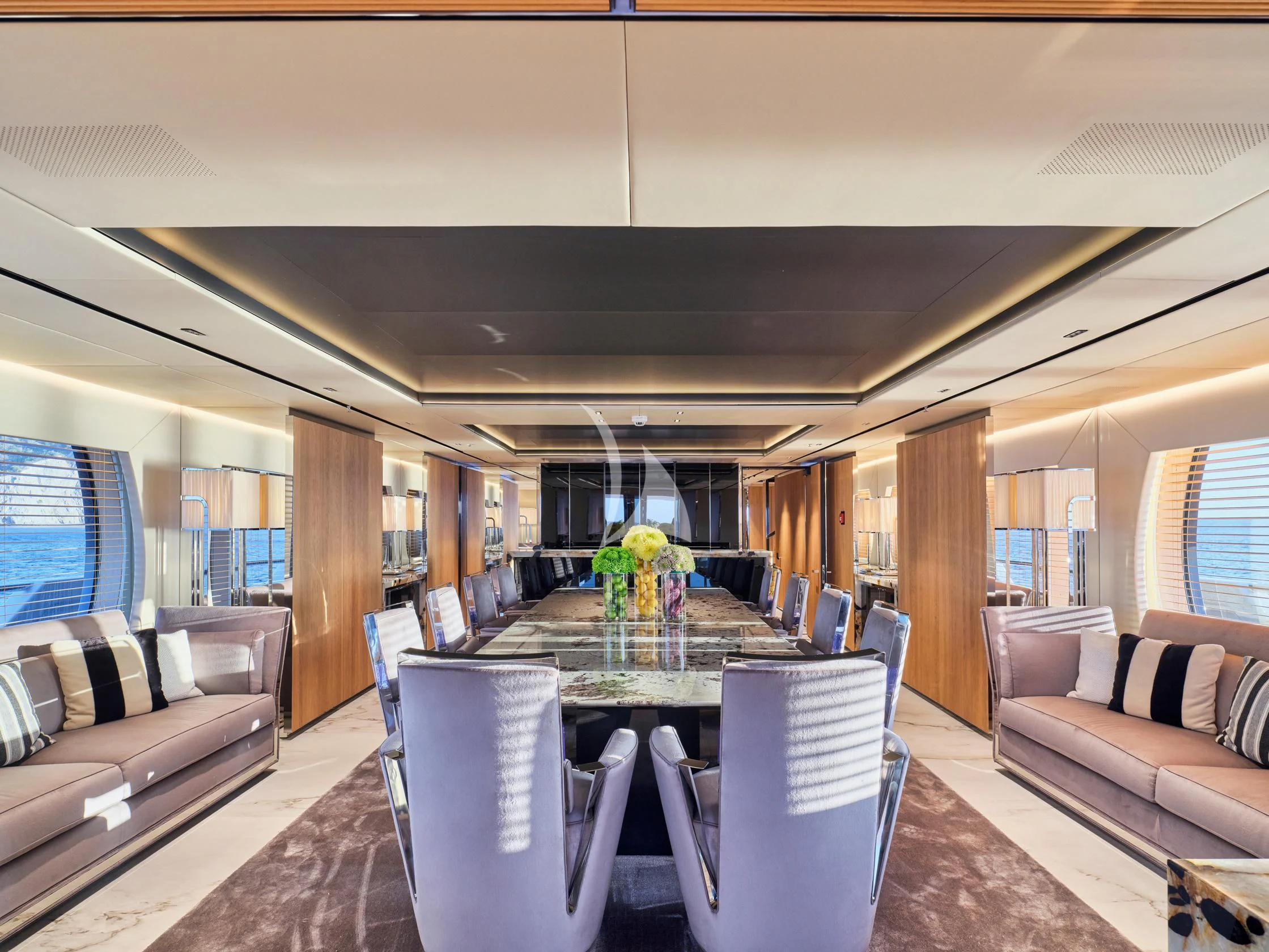 a room with a table and chairs aboard SEAHORSE Yacht for Sale