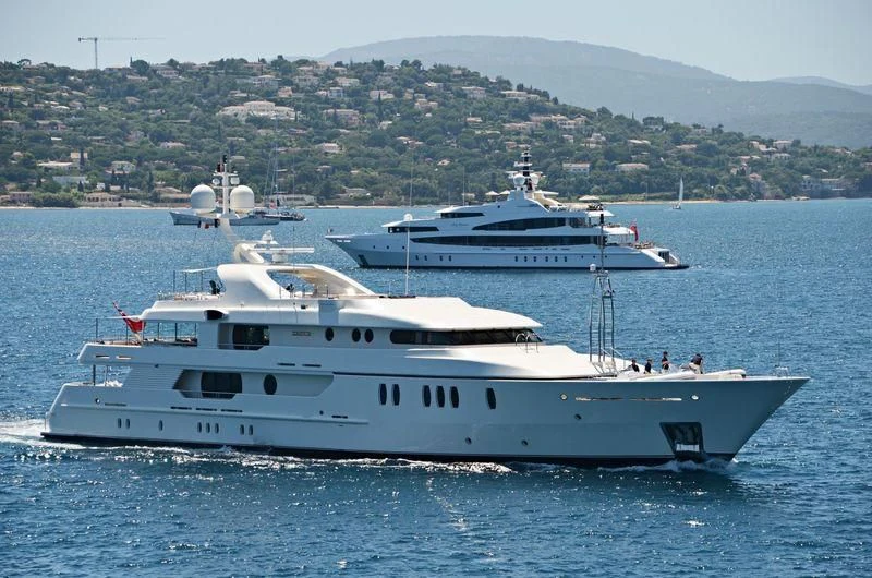 a couple of large white boats in the water aboard SEAHORSE Yacht for Sale