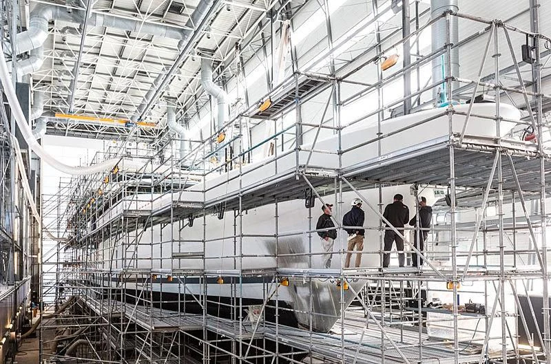 a group of people standing on a large white ship aboard SEAHORSE Yacht for Sale