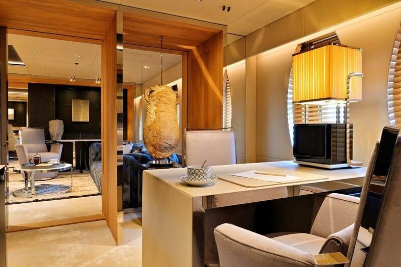 a room with a table and chairs aboard SEAHORSE Yacht for Sale