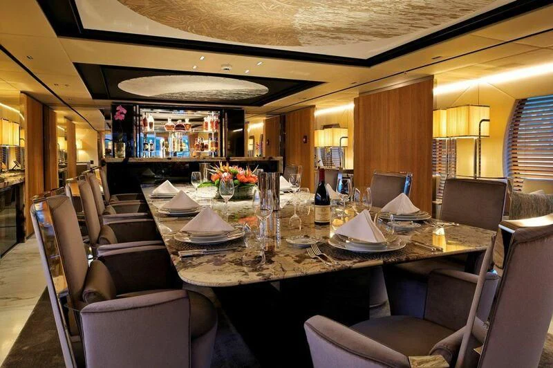 a dining table in a train car aboard SEAHORSE Yacht for Sale