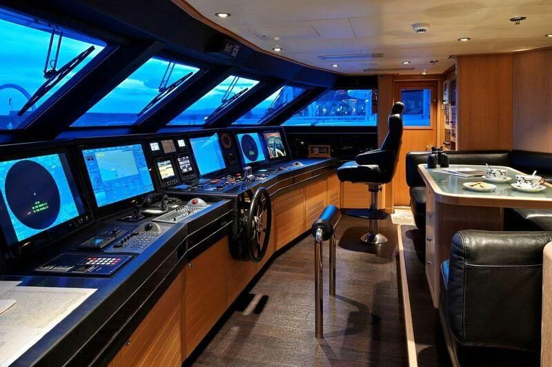 a room with many monitors and chairs aboard SEAHORSE Yacht for Sale