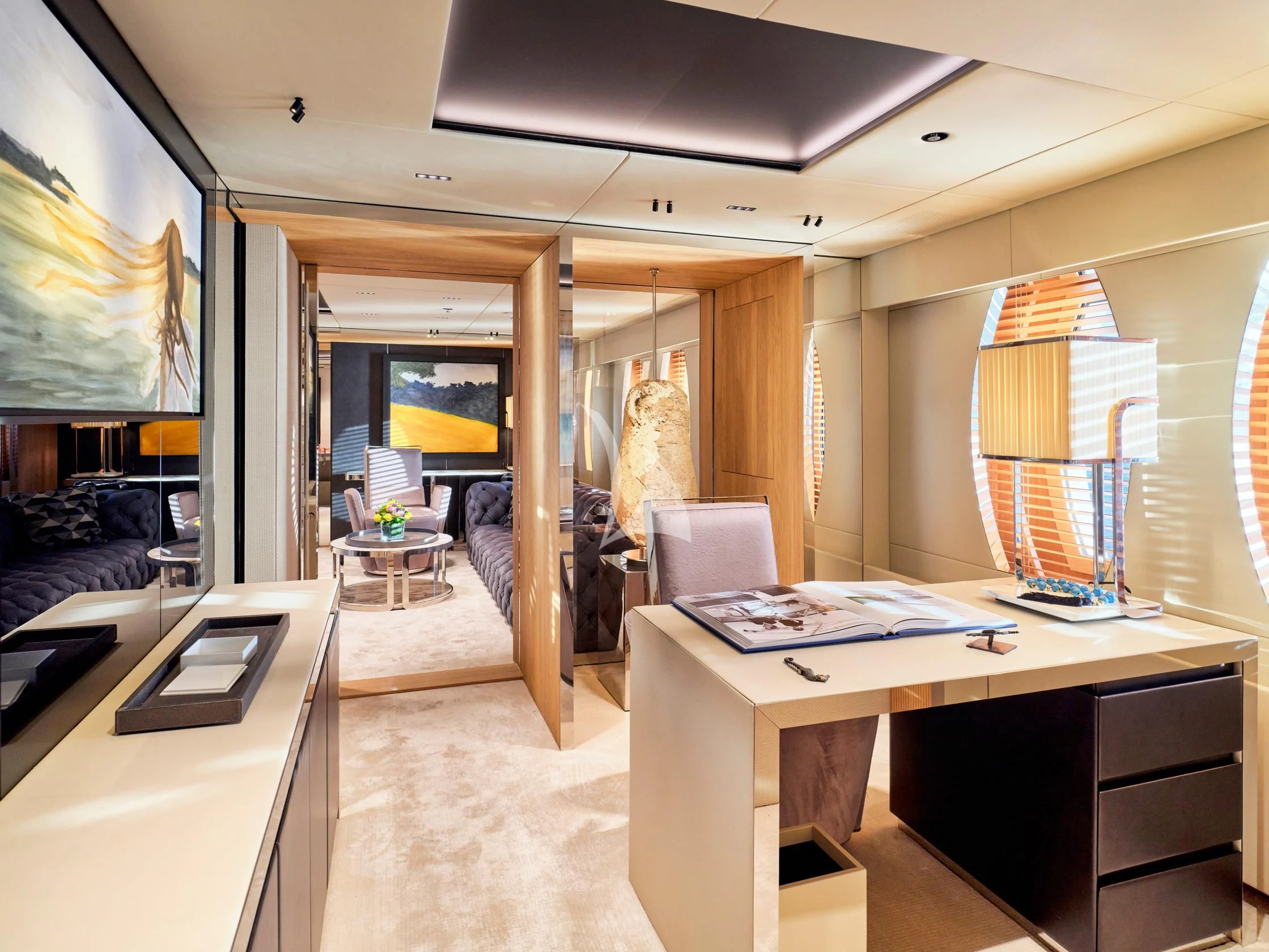 a room with a desk and a bed aboard SEAHORSE Yacht for Sale