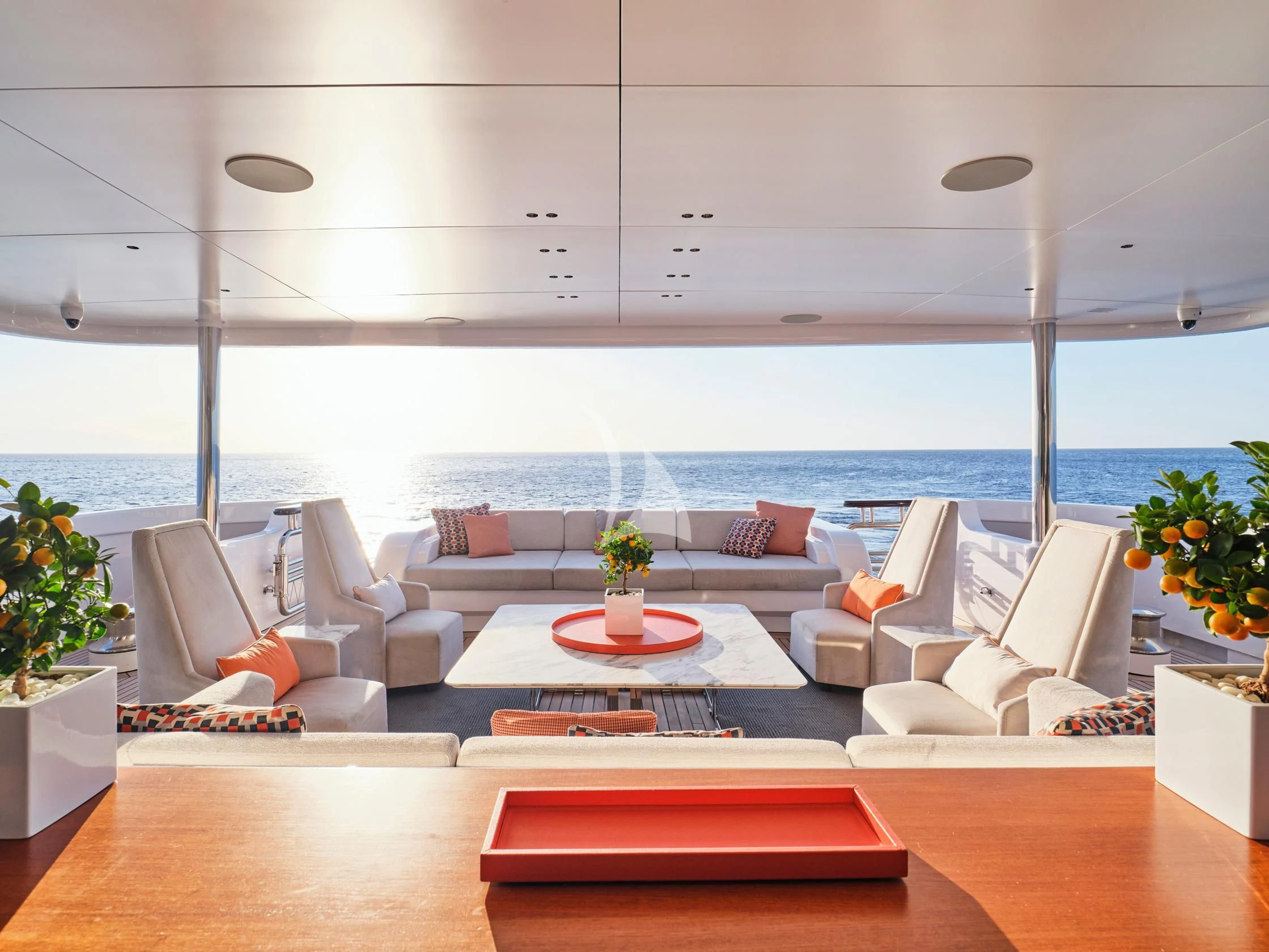 a room with a couch and a table and a large window aboard SEAHORSE Yacht for Sale