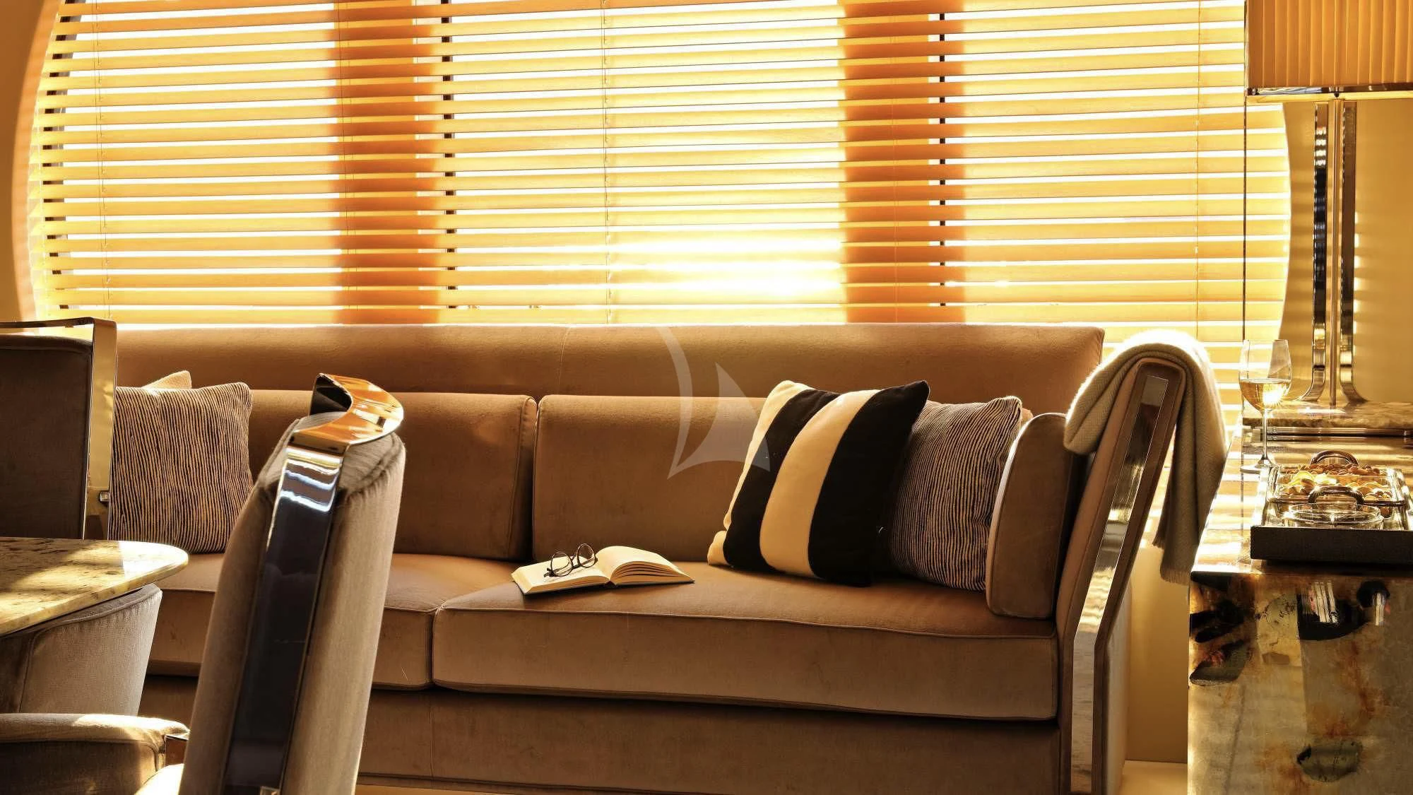 a couch with pillows and a chair aboard SEAHORSE Yacht for Sale