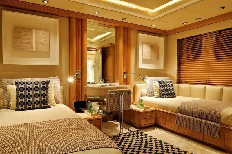 a hotel room with two beds aboard SEAHORSE Yacht for Sale