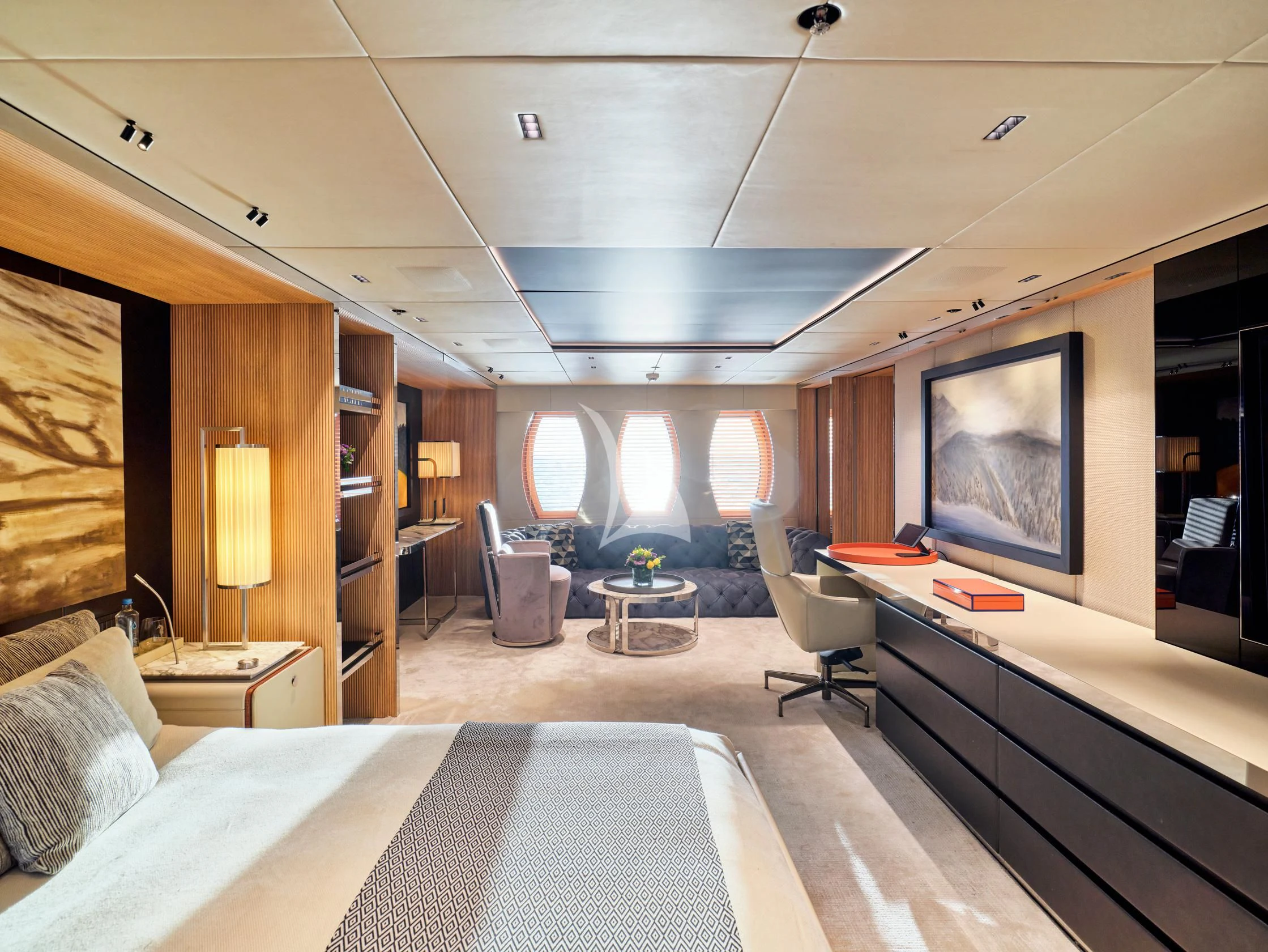 a room with a bed and a tv on the wall aboard SEAHORSE Yacht for Sale