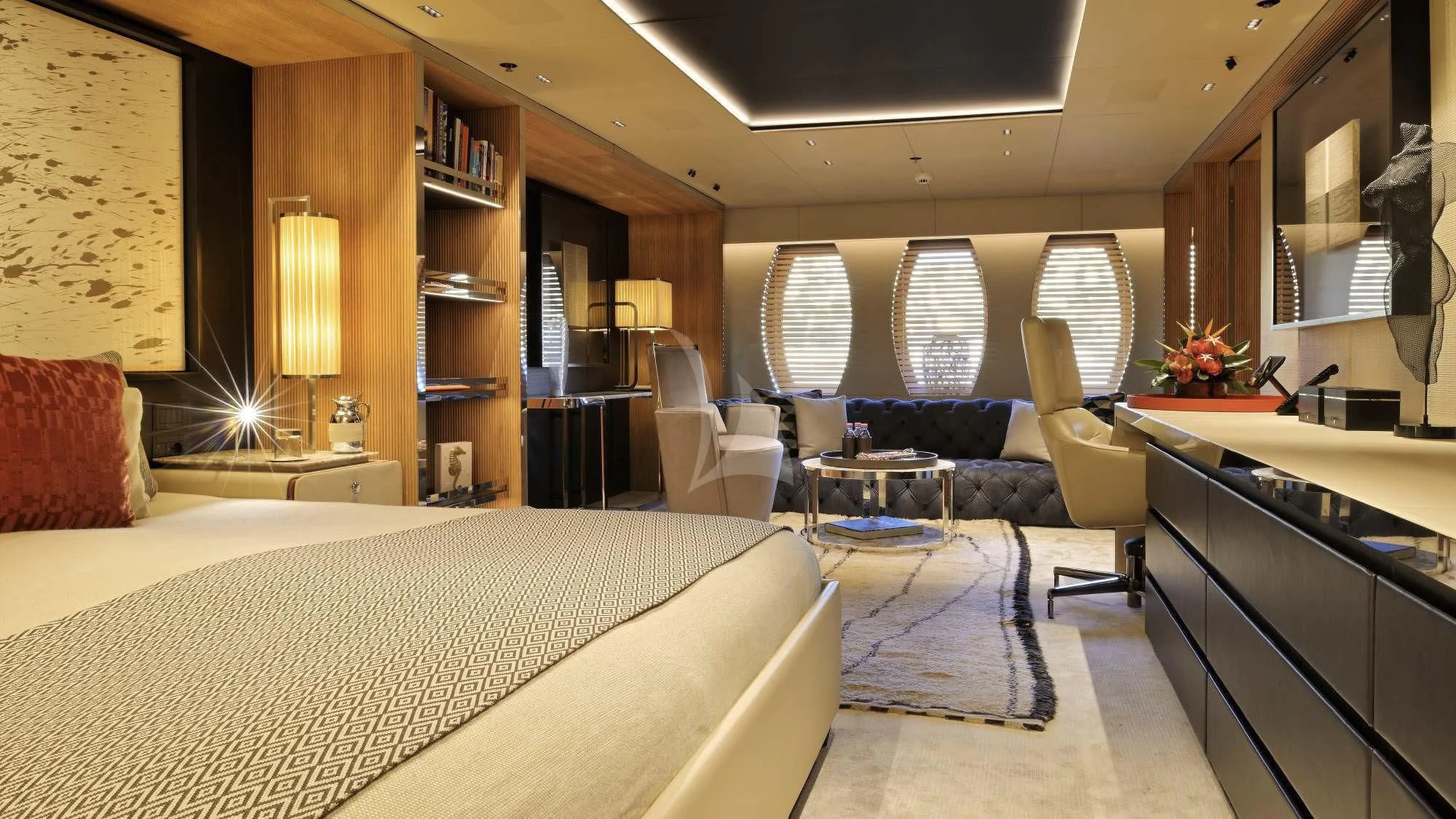 a room with a bed and a couch aboard SEAHORSE Yacht for Sale