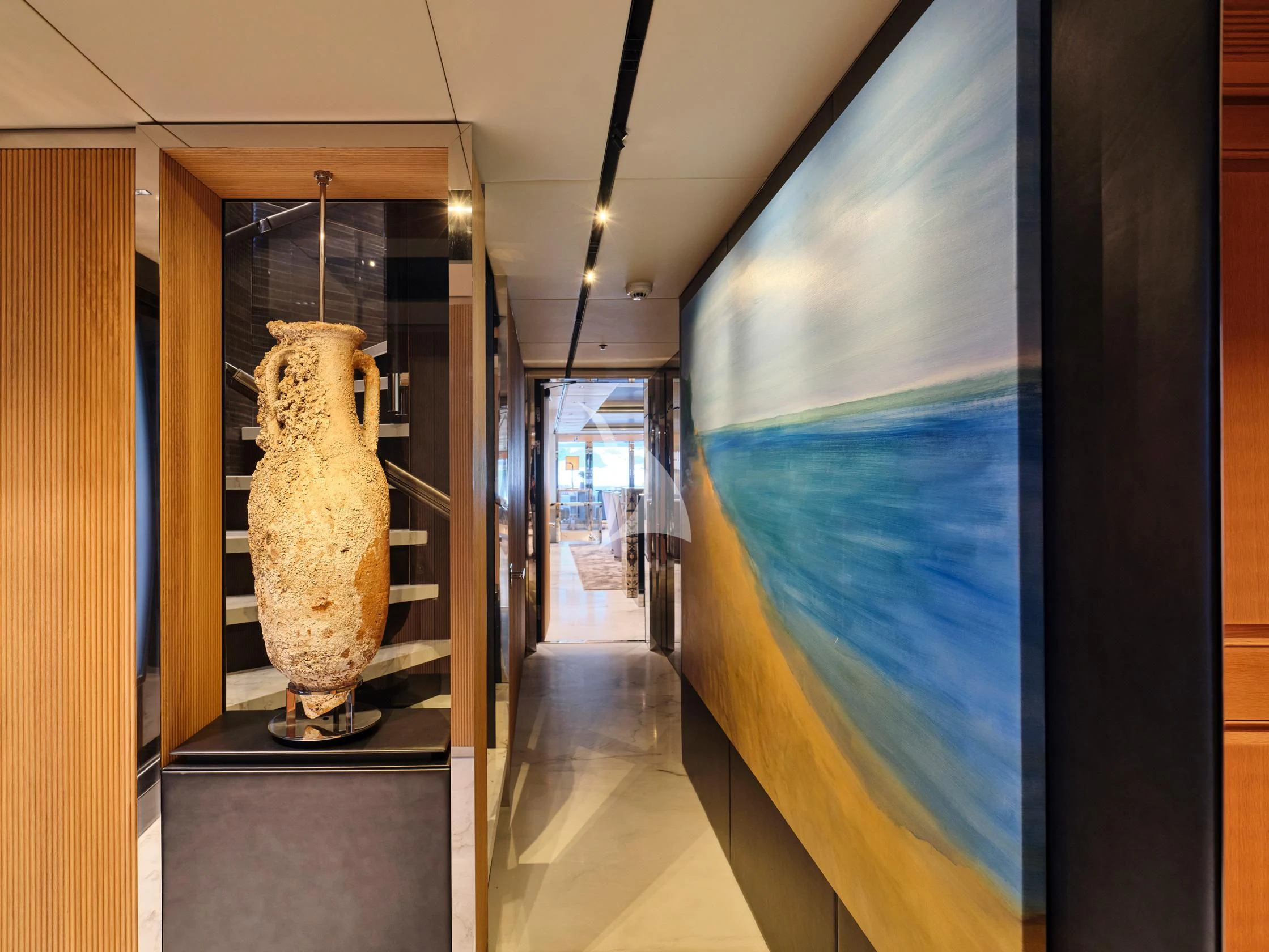 a vase on display in a museum aboard SEAHORSE Yacht for Sale