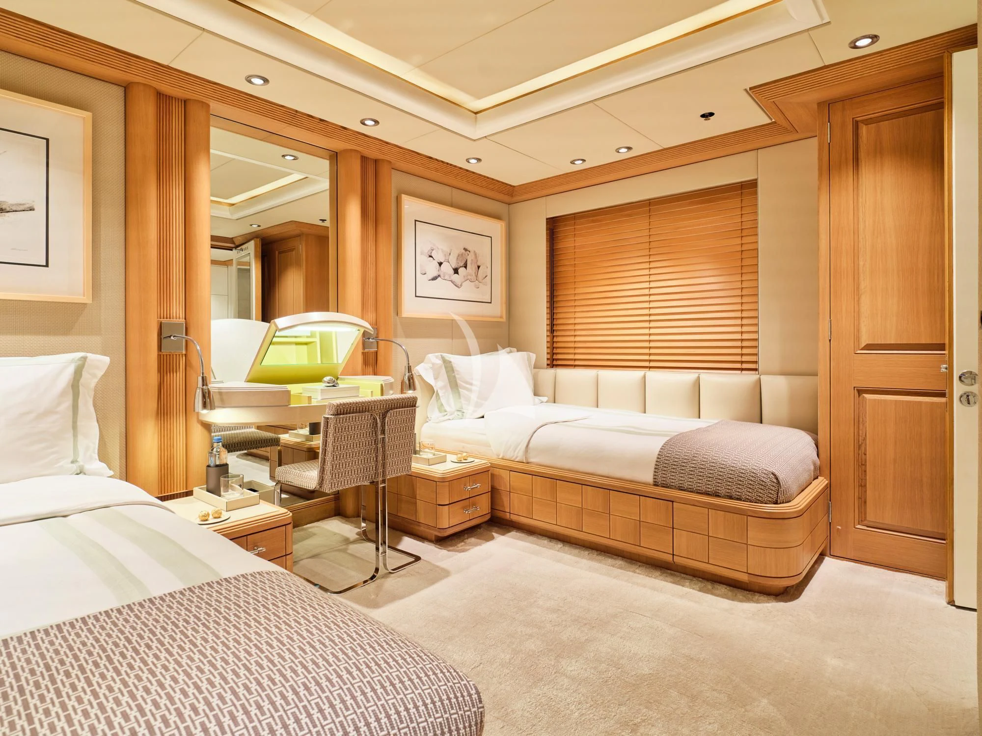 a room with a bed and a desk aboard SEAHORSE Yacht for Sale