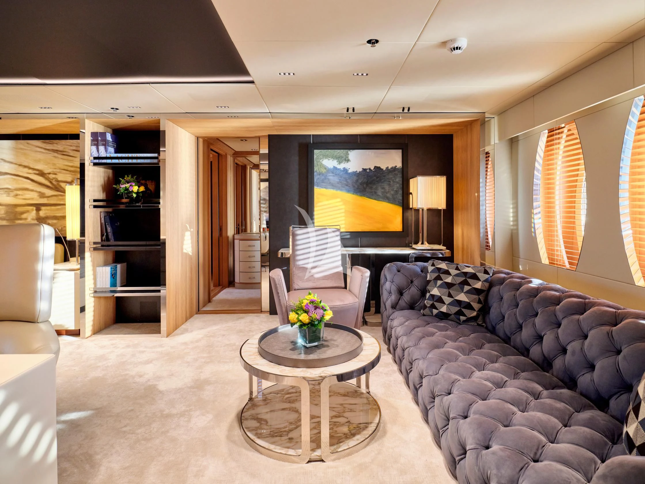 a living room with a couch and a coffee table aboard SEAHORSE Yacht for Sale
