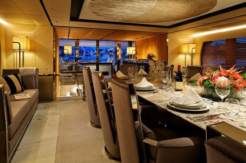 a room with a table and chairs aboard SEAHORSE Yacht for Sale