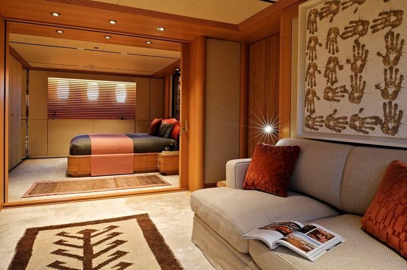 a living room with a couch and a rug aboard SEAHORSE Yacht for Sale
