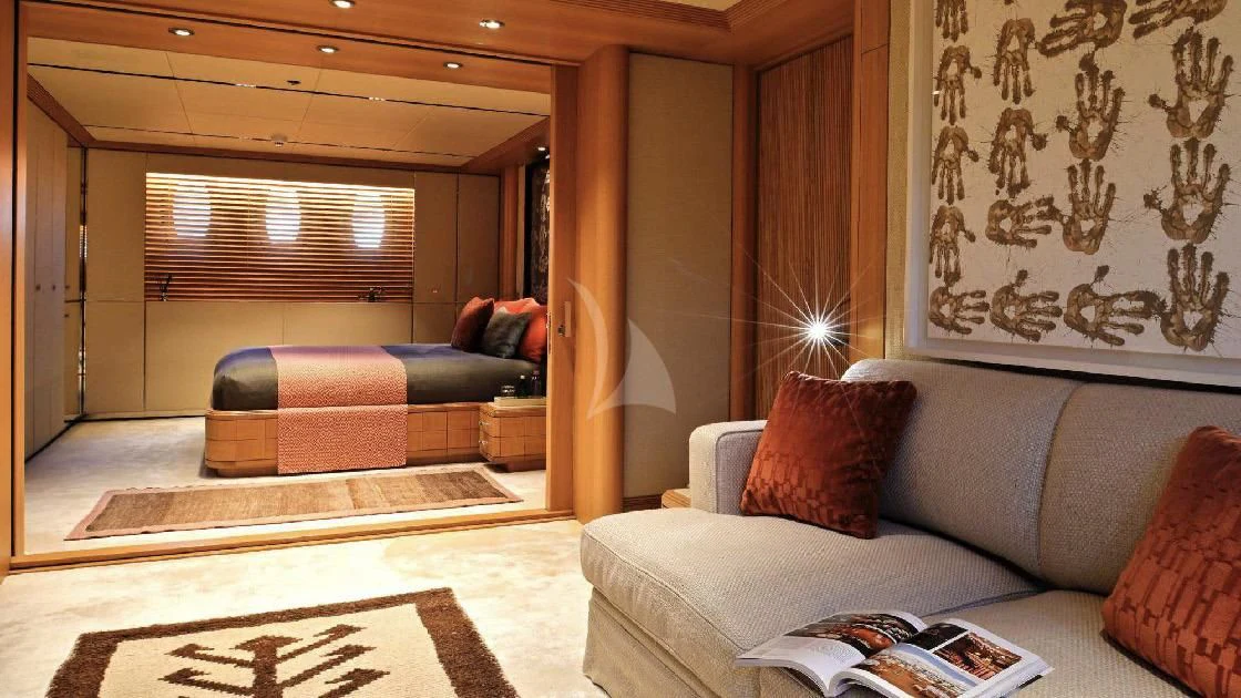 a living room with a couch and a rug aboard SEAHORSE Yacht for Sale