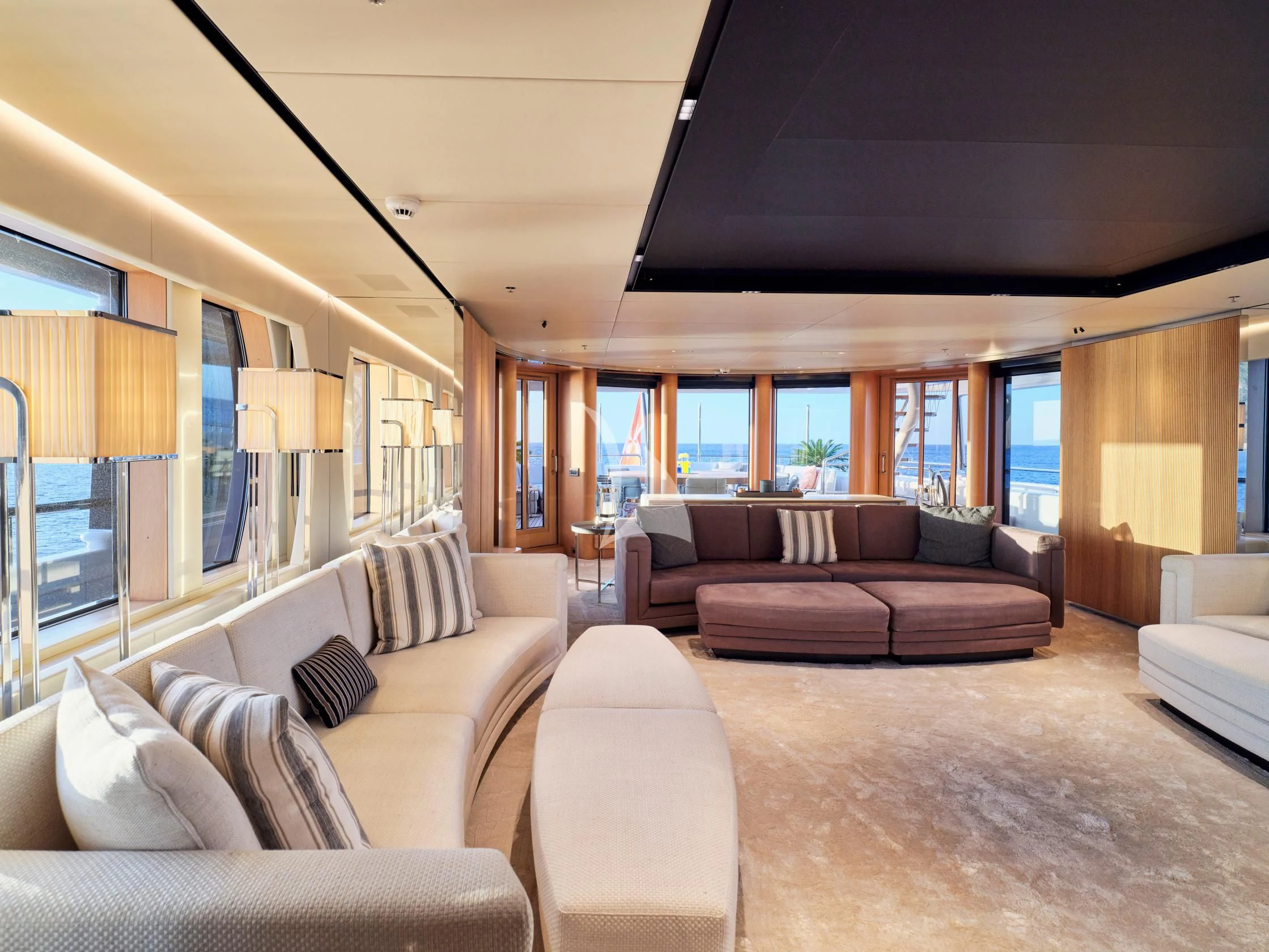 a living room with a large window aboard SEAHORSE Yacht for Sale