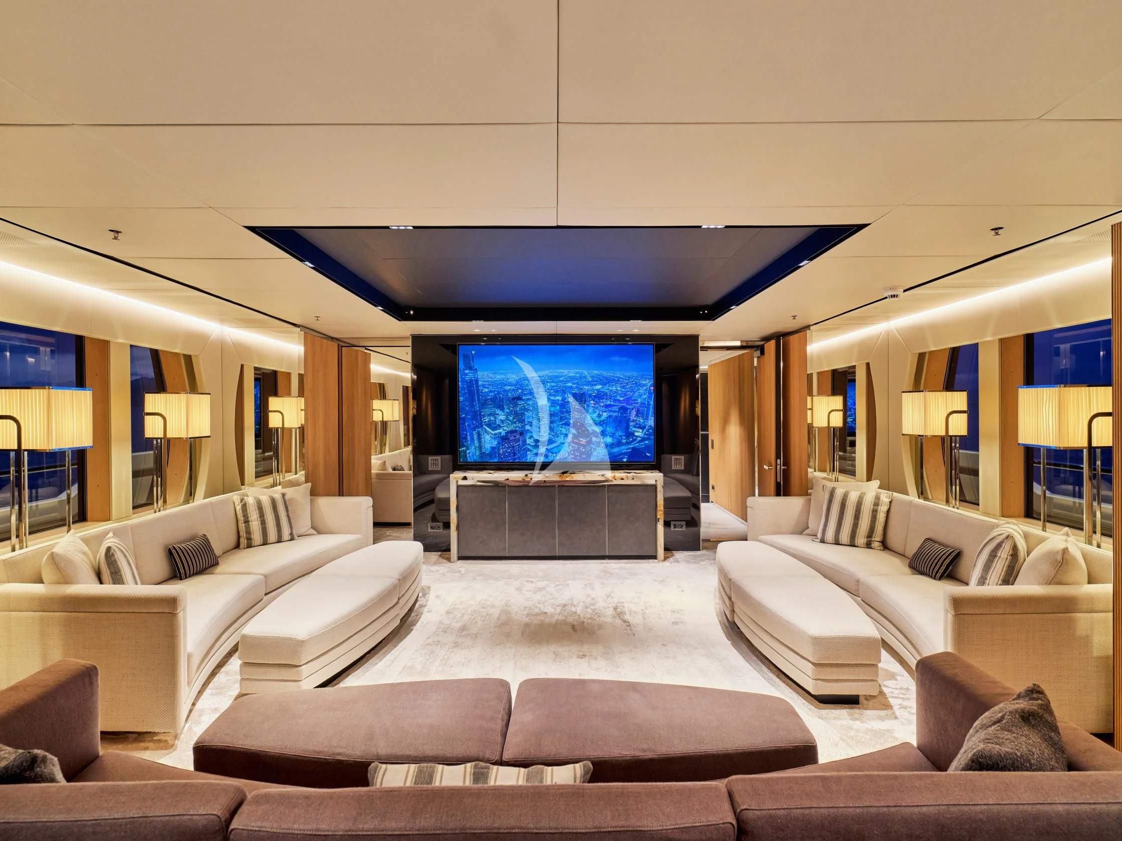 a living room with a large screen aboard SEAHORSE Yacht for Sale