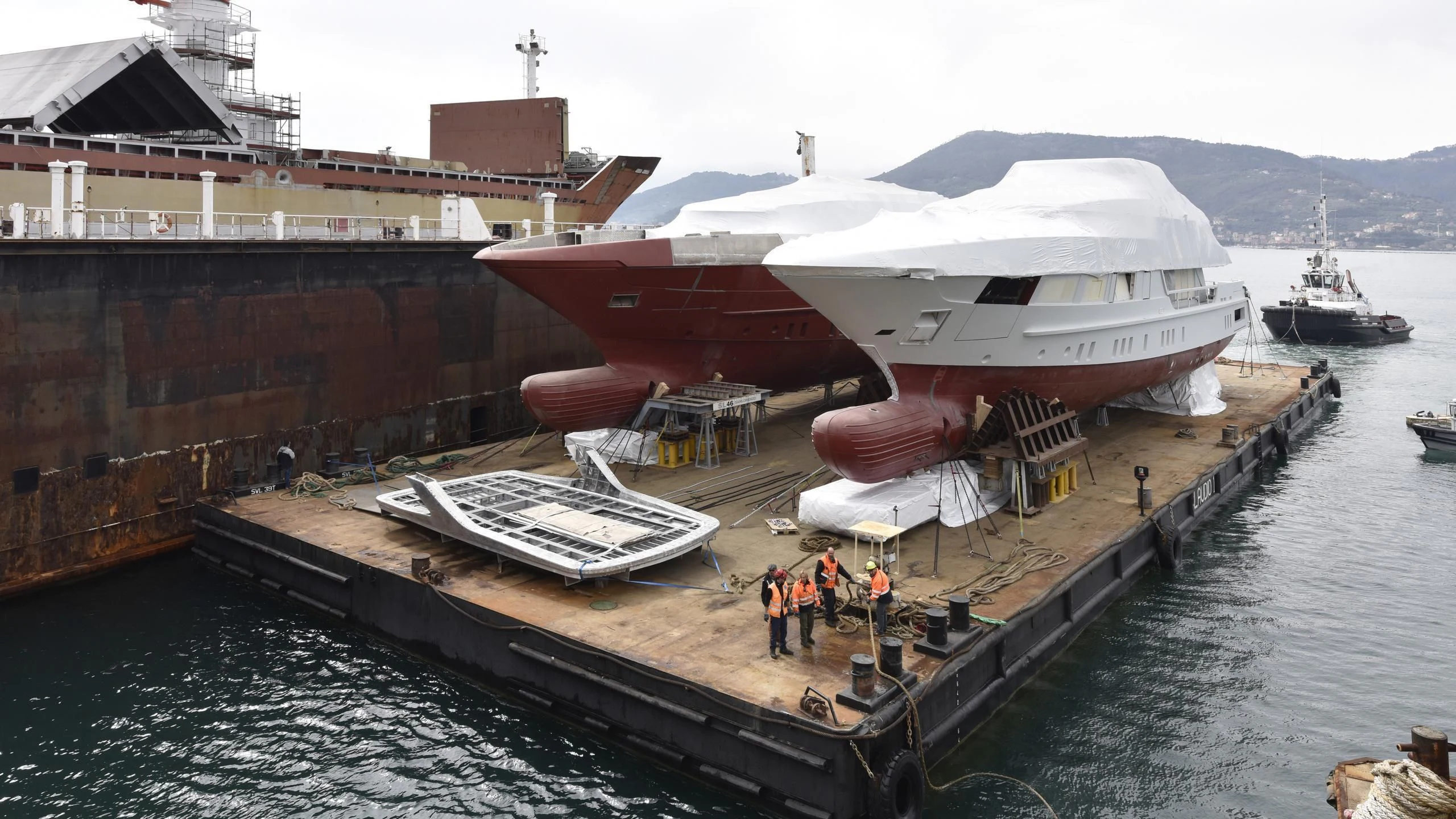 a boat docked at a pier aboard SEVEN SINS Yacht for Sale