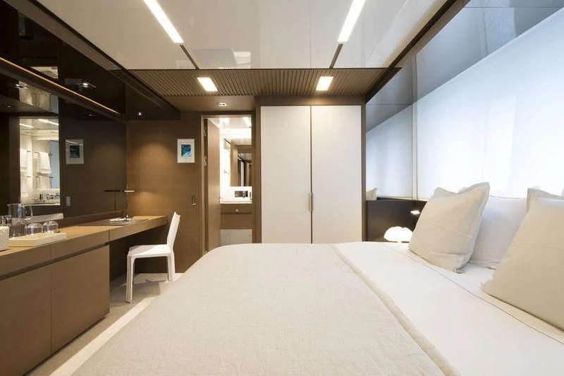 a hotel room with a bed aboard SEVEN SINS Yacht for Sale