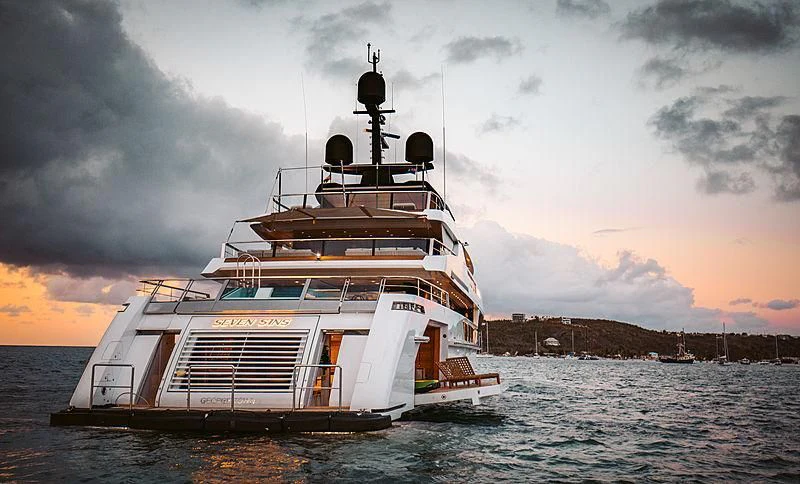 a large ship in the water aboard SEVEN SINS Yacht for Sale