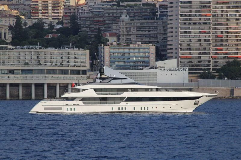 a large white boat in the water aboard SEVEN SINS Yacht for Sale