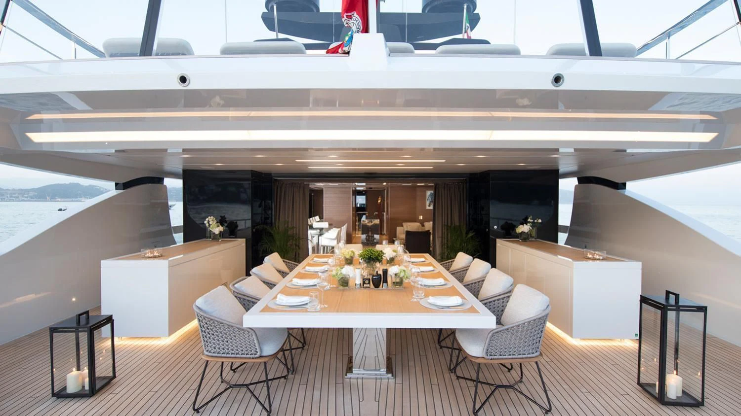 a room with a table and chairs aboard SEVEN SINS Yacht for Sale