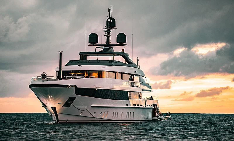 a large white ship in the water aboard SEVEN SINS Yacht for Sale