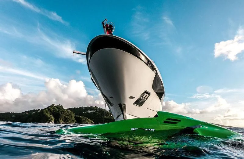 a person on a kayak in the water aboard SEVEN SINS Yacht for Sale