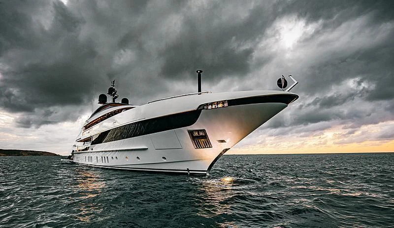 a white yacht in the water aboard SEVEN SINS Yacht for Sale