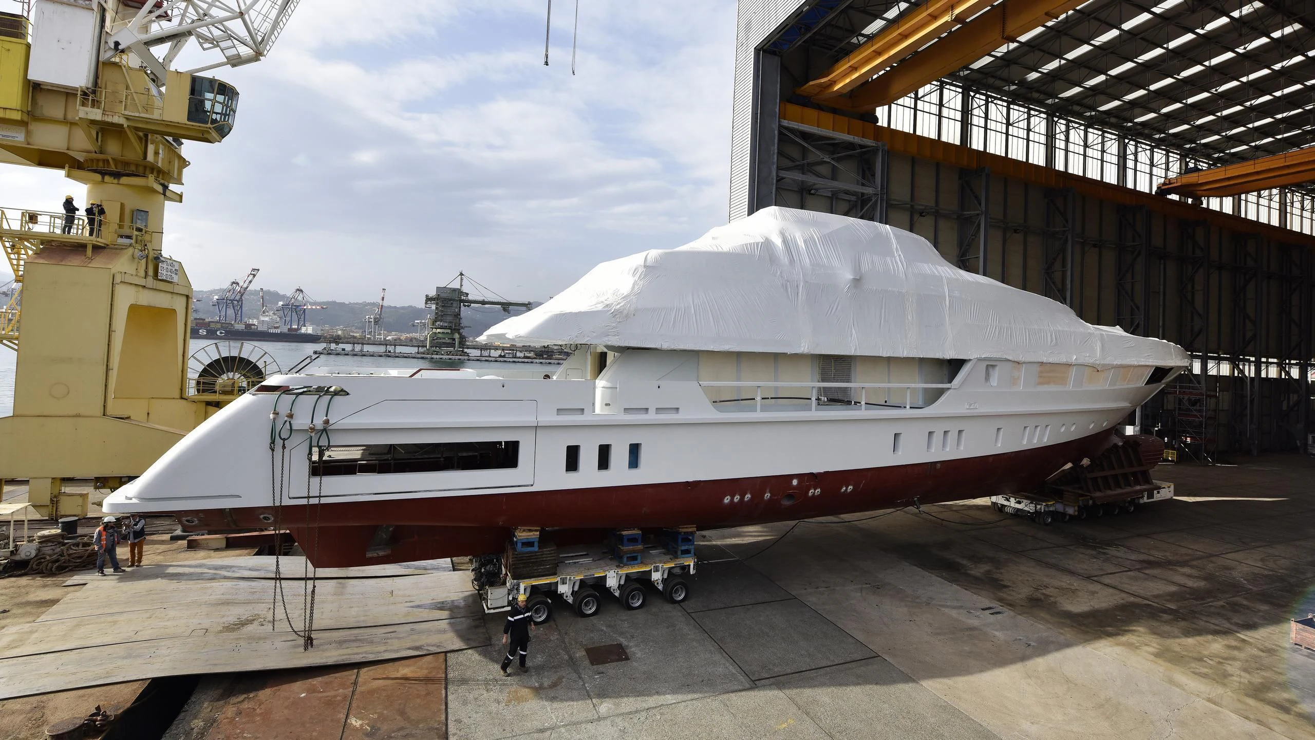 a large white airplane aboard SEVEN SINS Yacht for Sale
