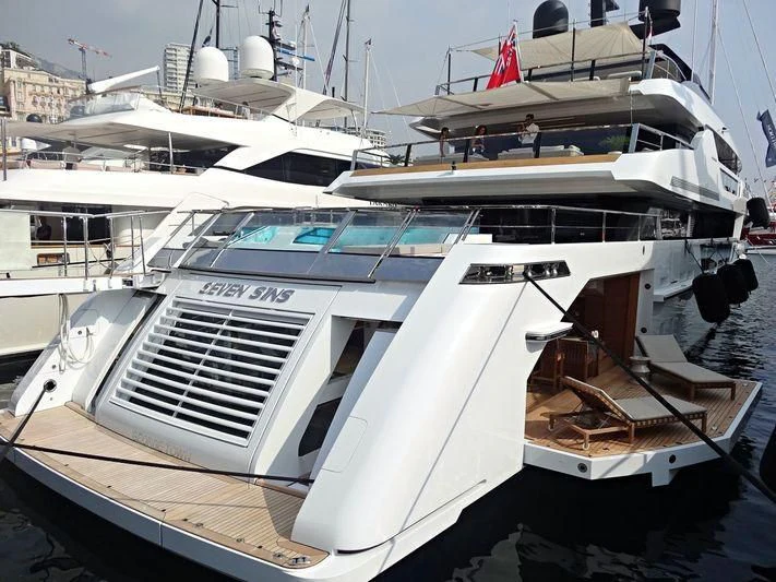 a boat docked at a pier aboard SEVEN SINS Yacht for Sale