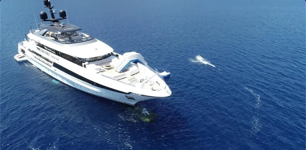 a white yacht in the water aboard SEVEN SINS Yacht for Sale