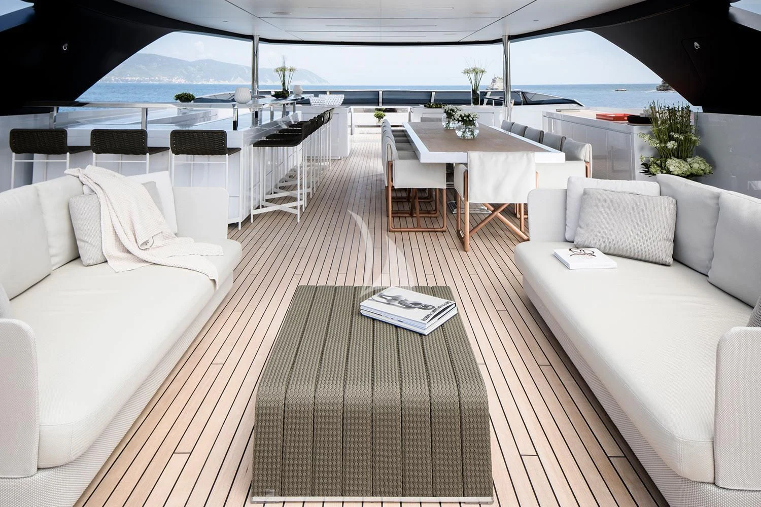 a room with a couch and a table and chairs aboard SEVEN SINS Yacht for Sale