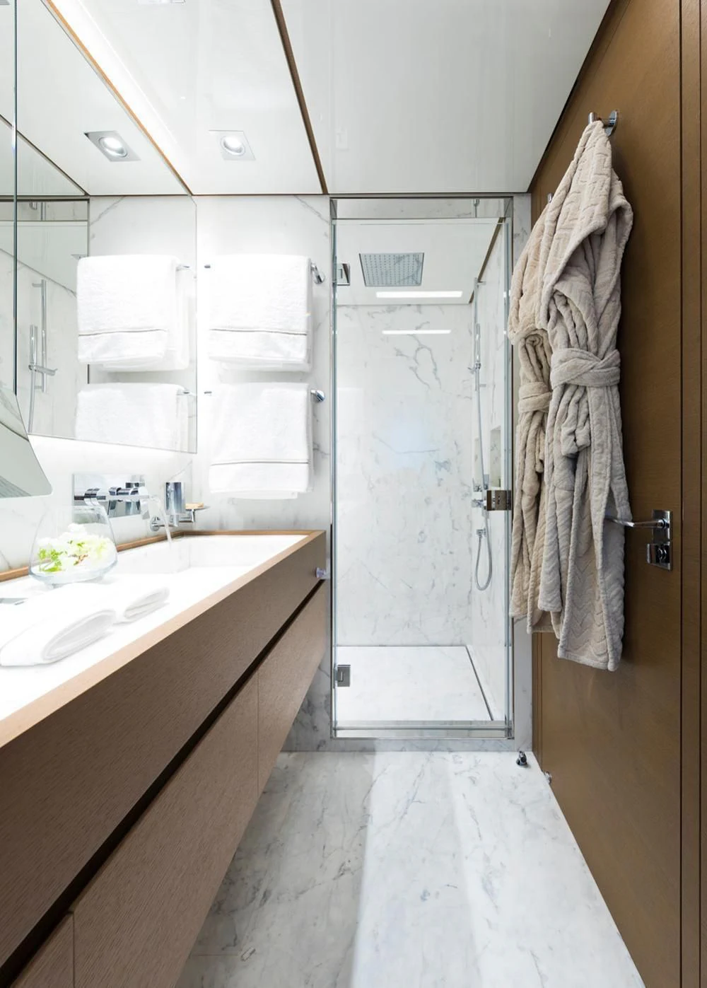 a bathroom with a sink and a mirror aboard SEVEN SINS Yacht for Sale