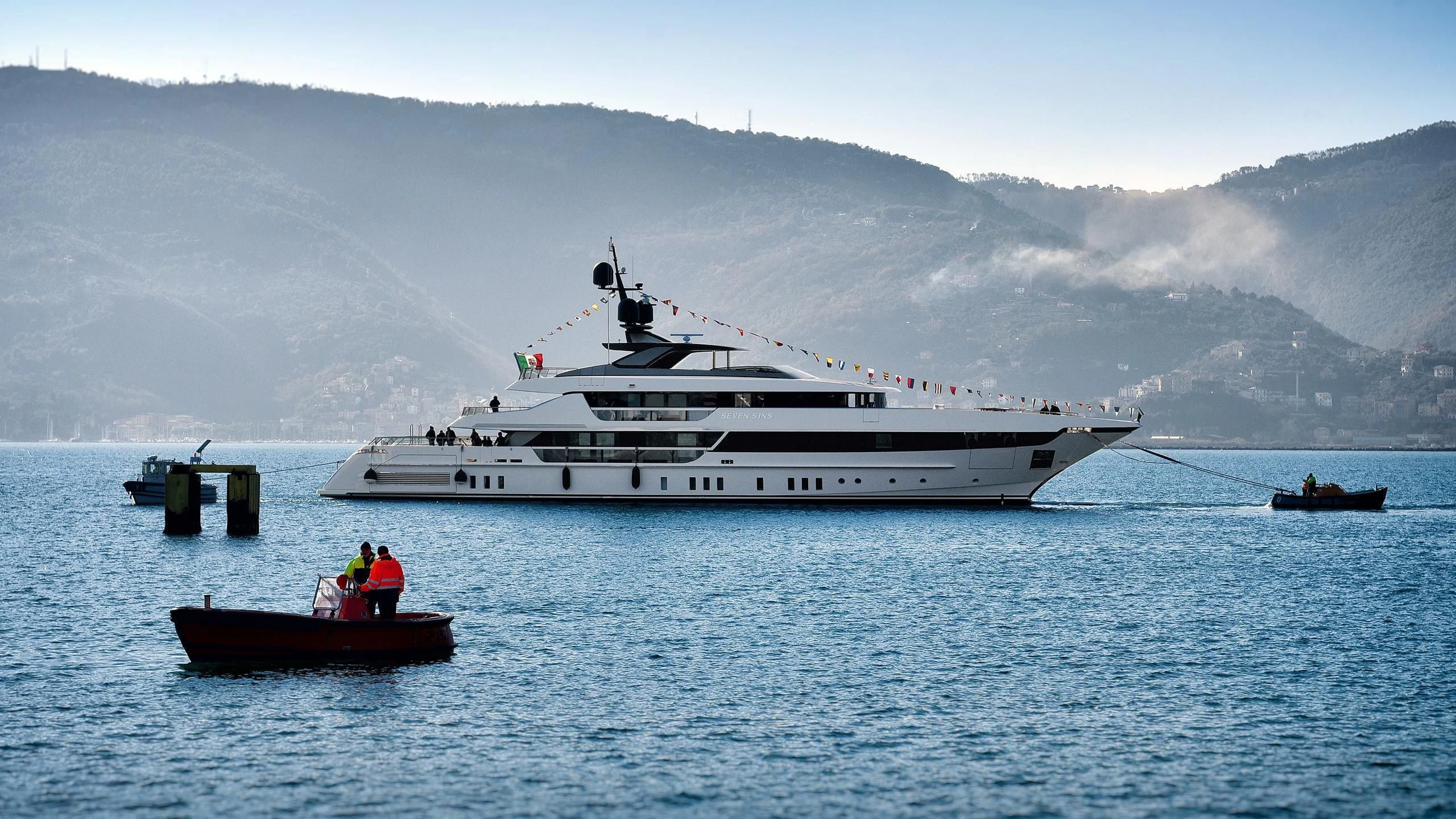 a large white boat in the water aboard SEVEN SINS Yacht for Sale