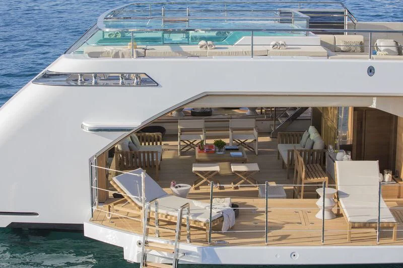a large white yacht aboard SEVEN SINS Yacht for Sale