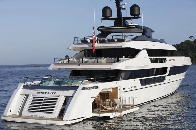 a large white yacht aboard SEVEN SINS Yacht for Sale