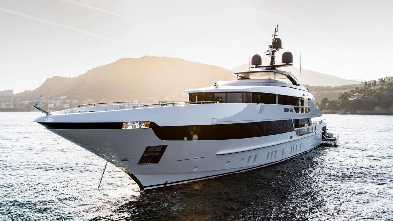a large white boat on the water aboard SEVEN SINS Yacht for Sale