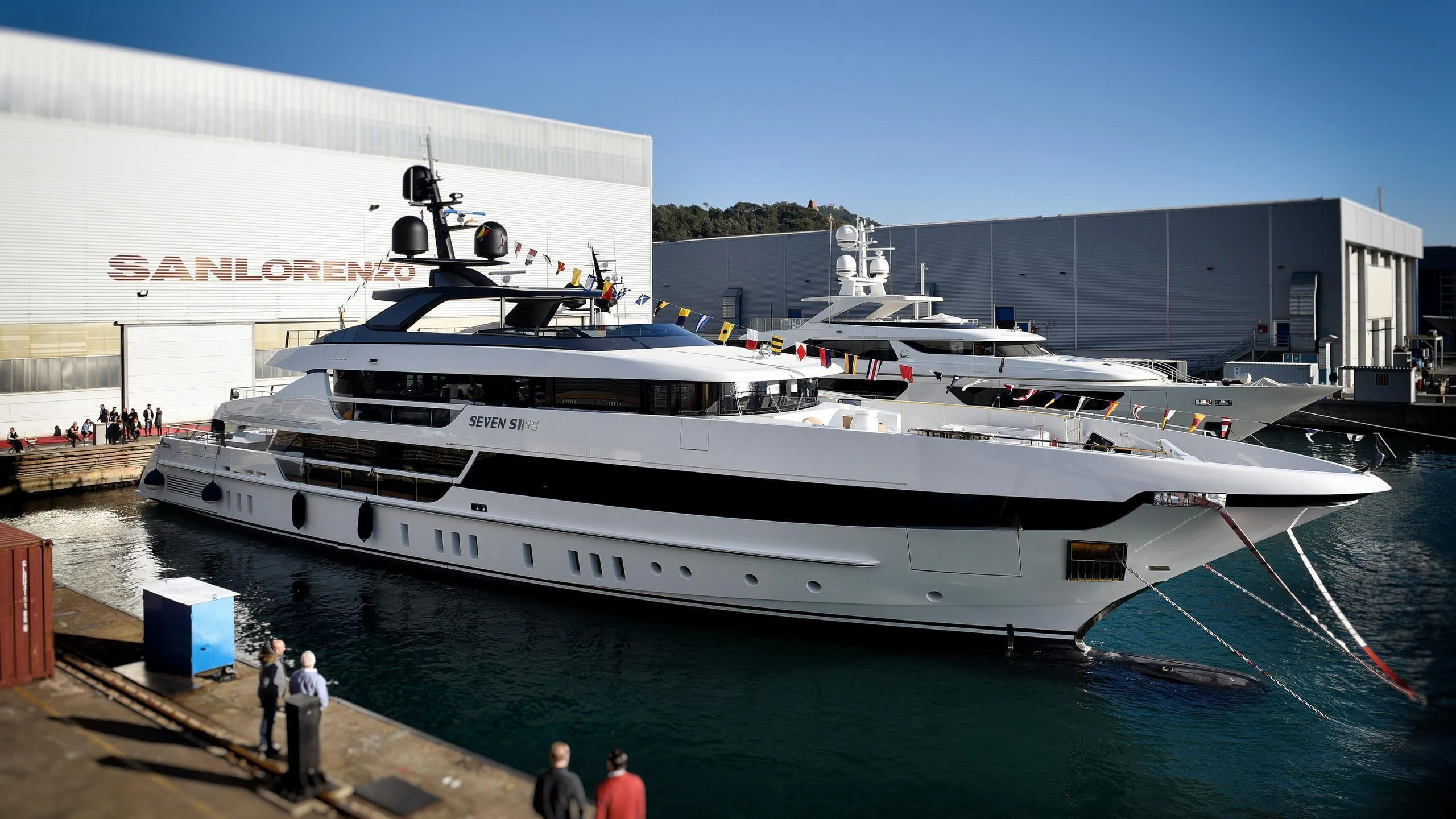 a large white ship docked aboard SEVEN SINS Yacht for Sale