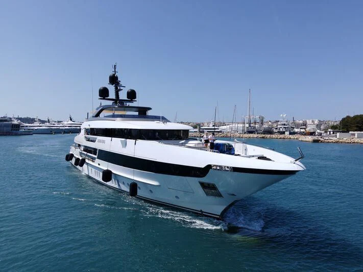 a white yacht on the water aboard SEVEN SINS Yacht for Sale