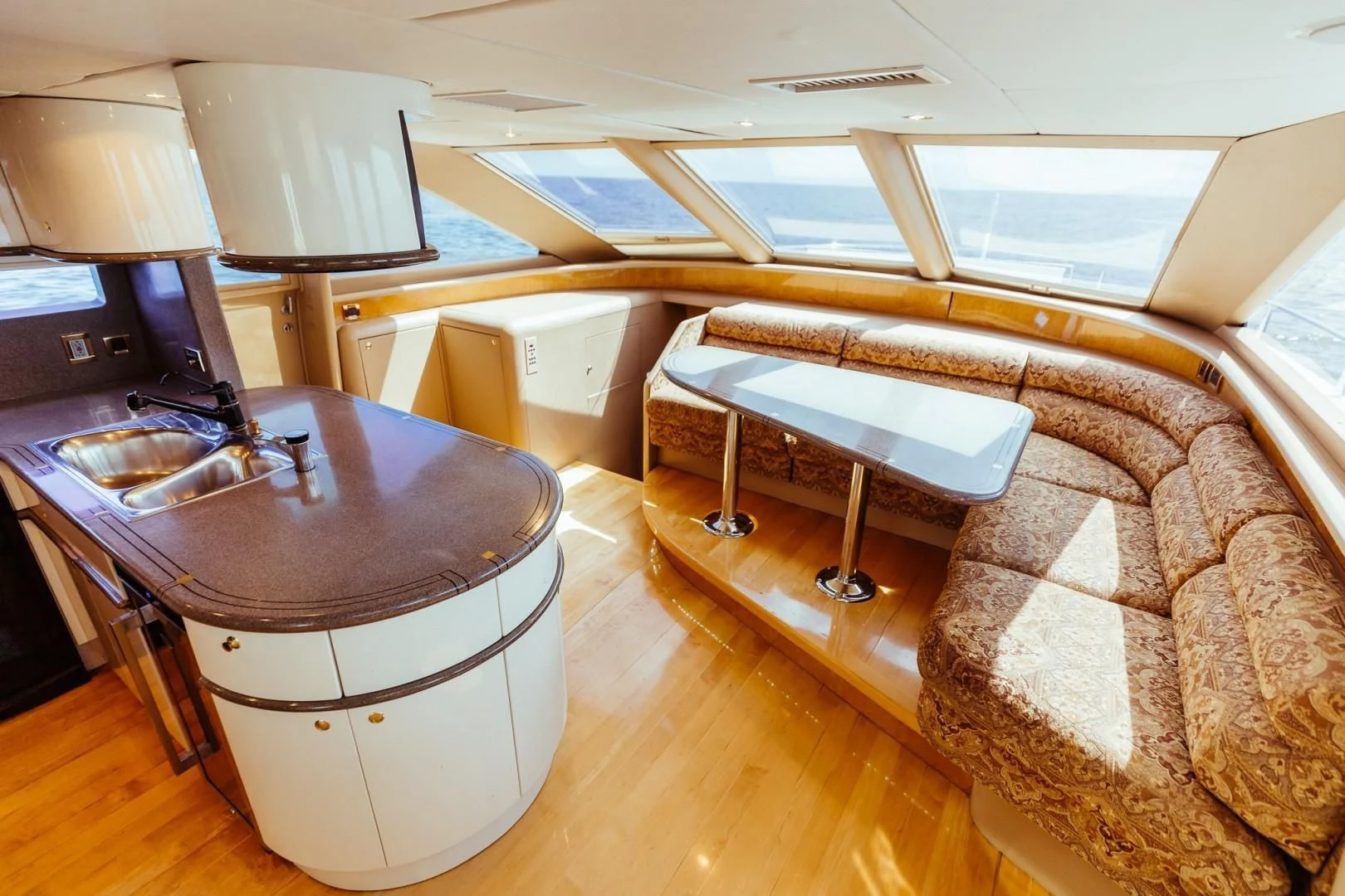 a room with a bed and a table aboard DOUBLE EAGLE Yacht for Sale