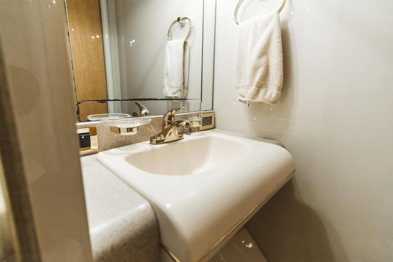 a bathroom with a sink and towels aboard DOUBLE EAGLE Yacht for Sale
