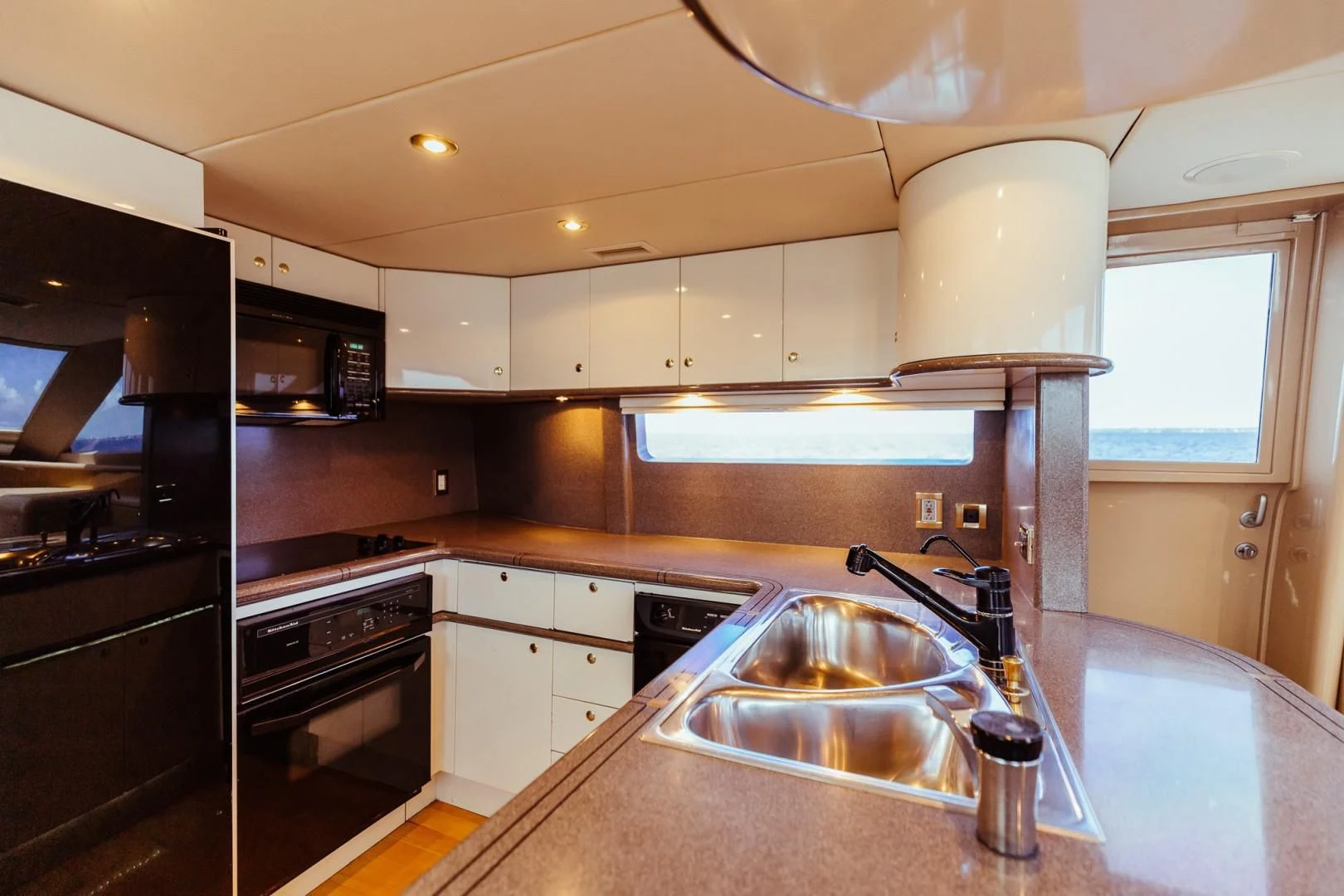 a kitchen with a sink and stove aboard DOUBLE EAGLE Yacht for Sale