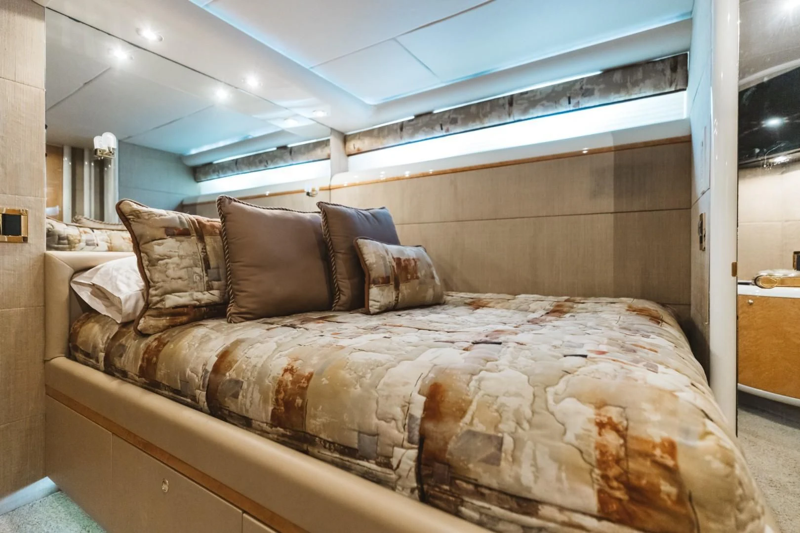 a bed with a large headboard aboard DOUBLE EAGLE Yacht for Sale