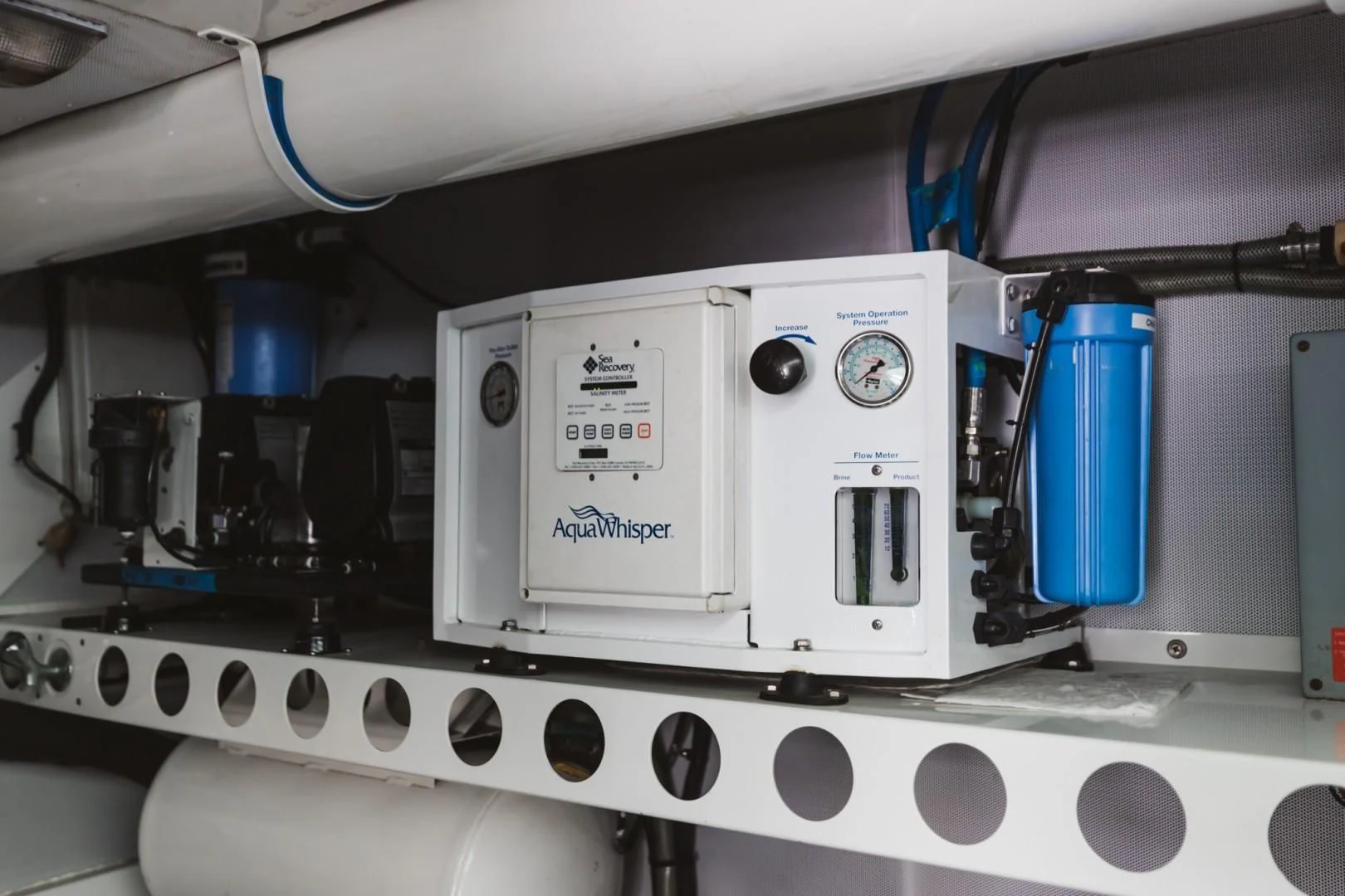 a white machine with a blue cup on top aboard DOUBLE EAGLE Yacht for Sale