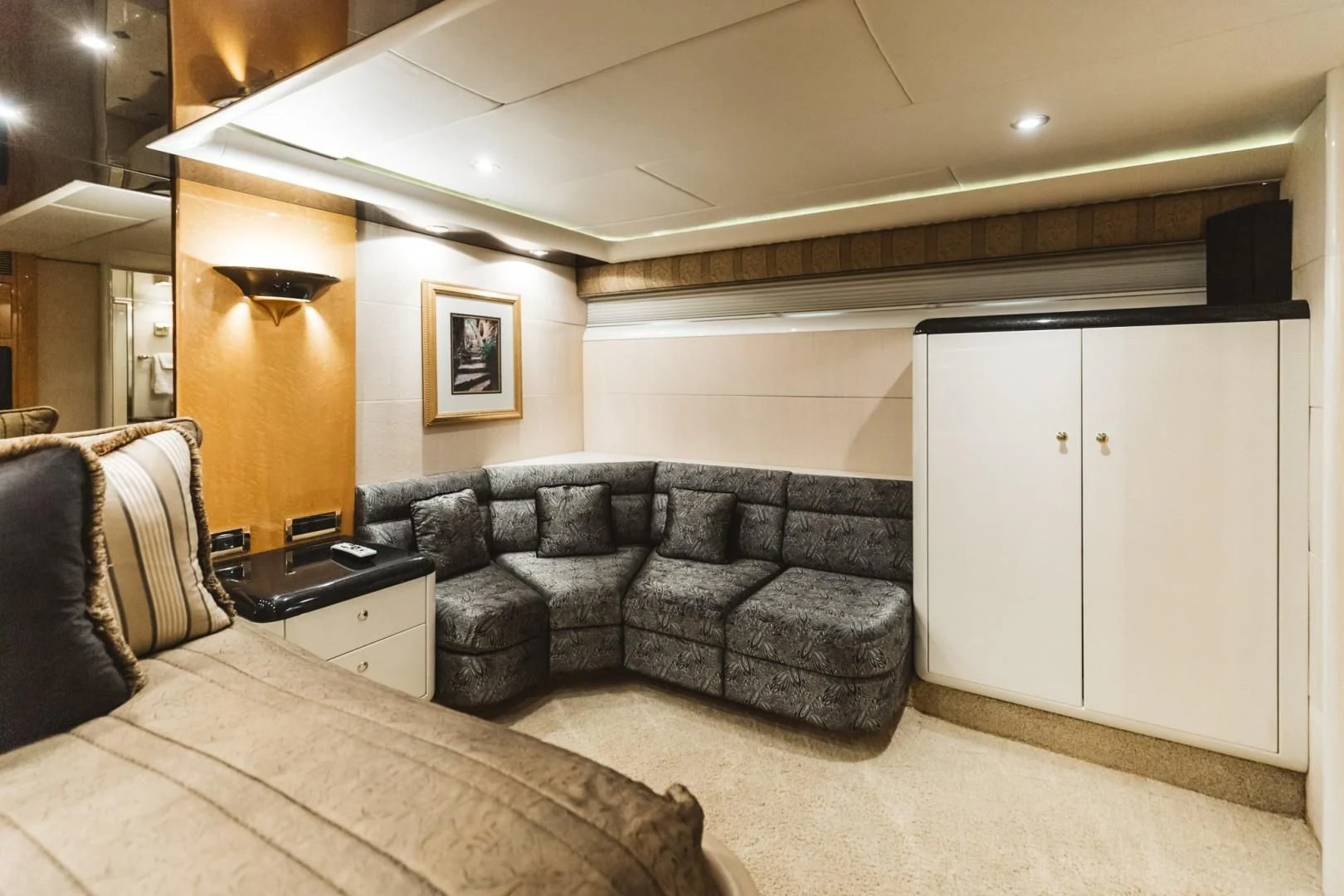 a living room with a couch and a door aboard DOUBLE EAGLE Yacht for Sale