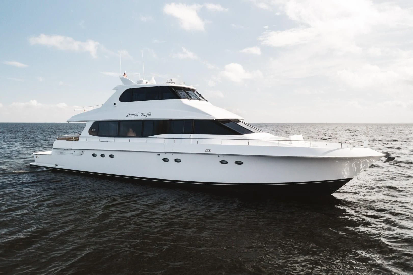 a white yacht in the water aboard DOUBLE EAGLE Yacht for Sale