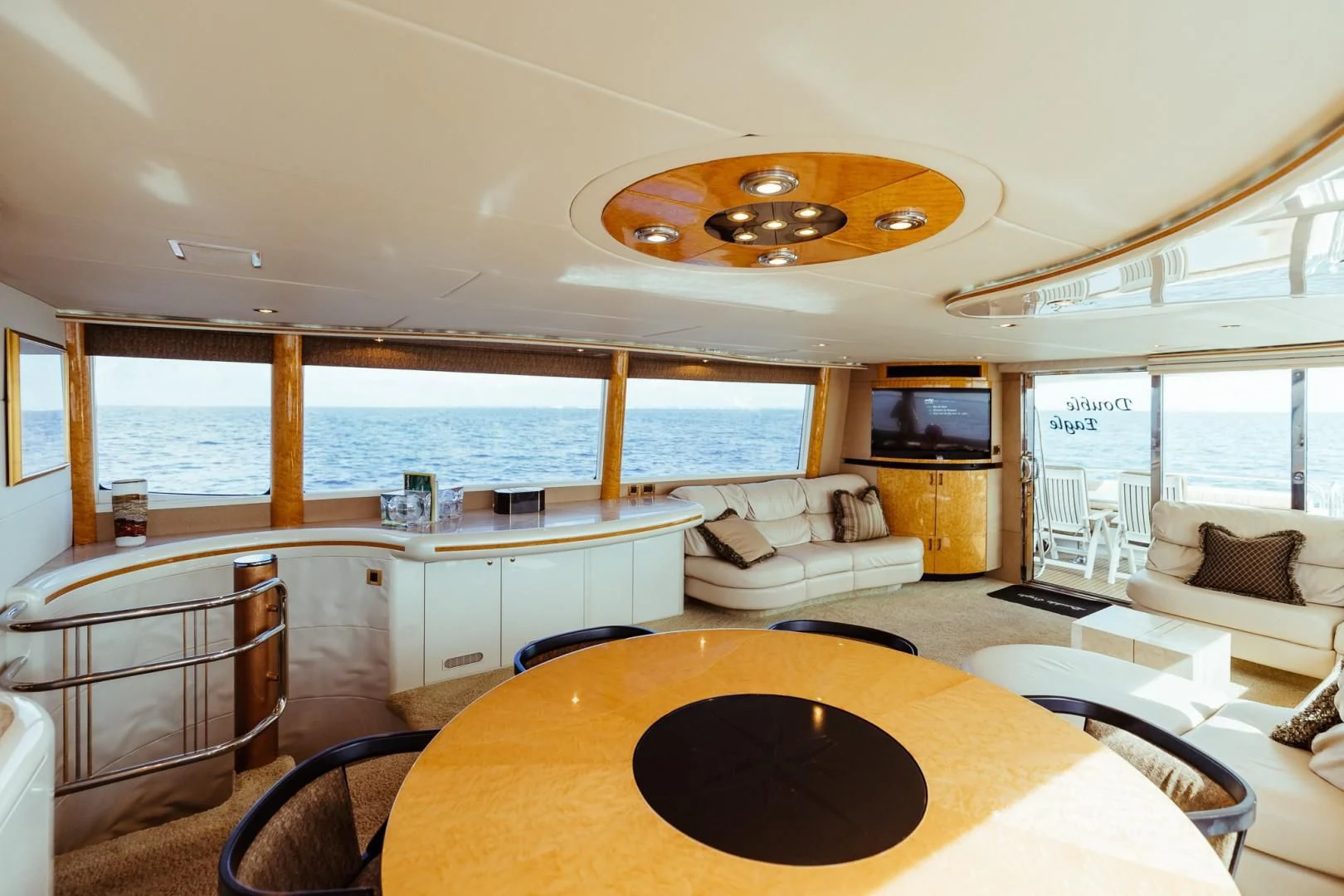 a large living room with a large balcony aboard DOUBLE EAGLE Yacht for Sale