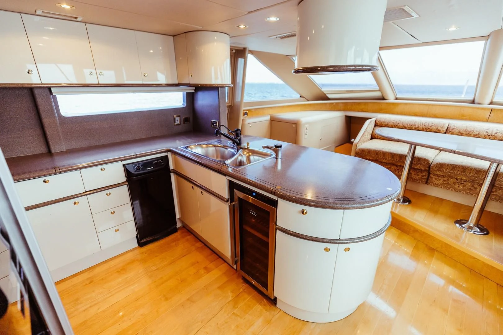 a kitchen with a sink and a bench aboard DOUBLE EAGLE Yacht for Sale