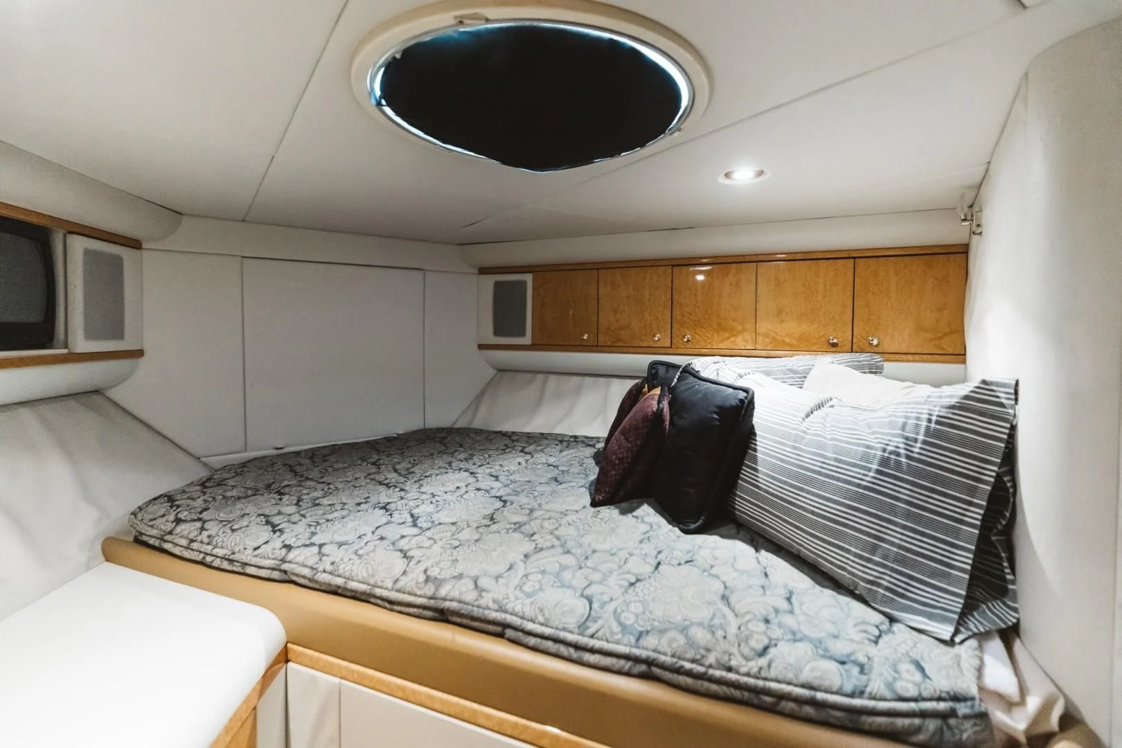 a bedroom with a large mirror aboard DOUBLE EAGLE Yacht for Sale